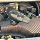 The Porsche M96 engine with a intake resonator delete kit installed.